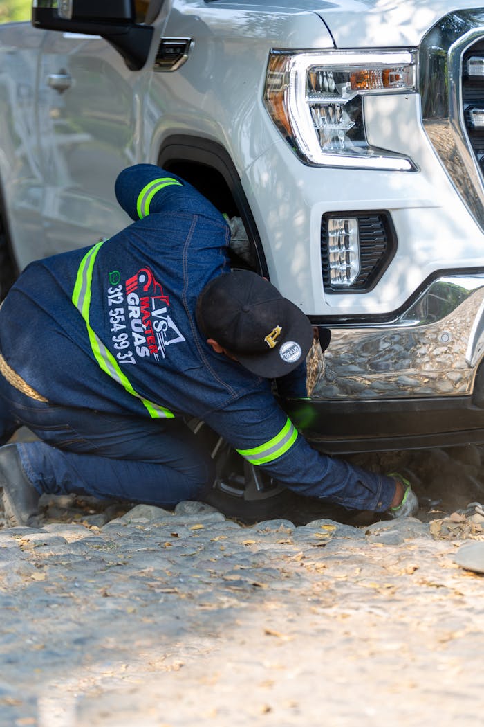 Man Fixing a Car